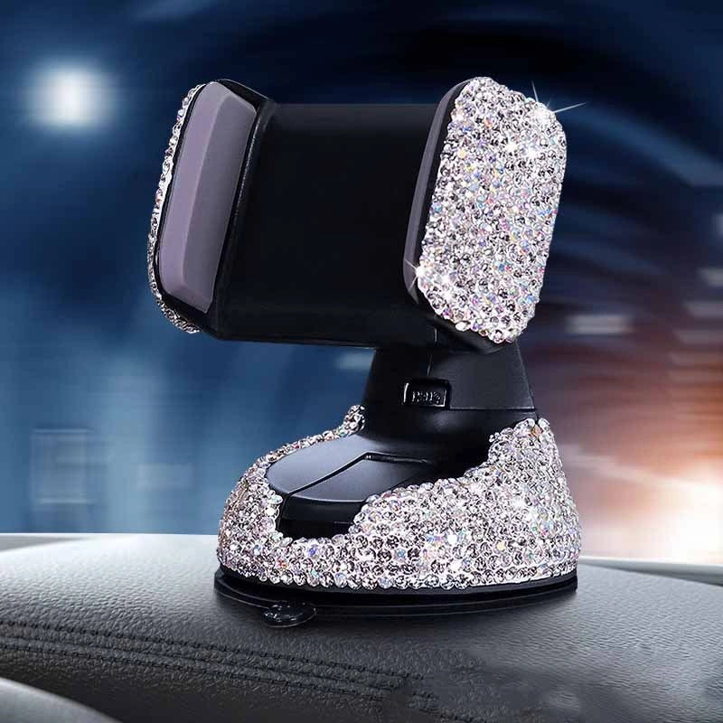 Diamond-encrusted car phone holder mounted on air vent with smartphone securely attached
