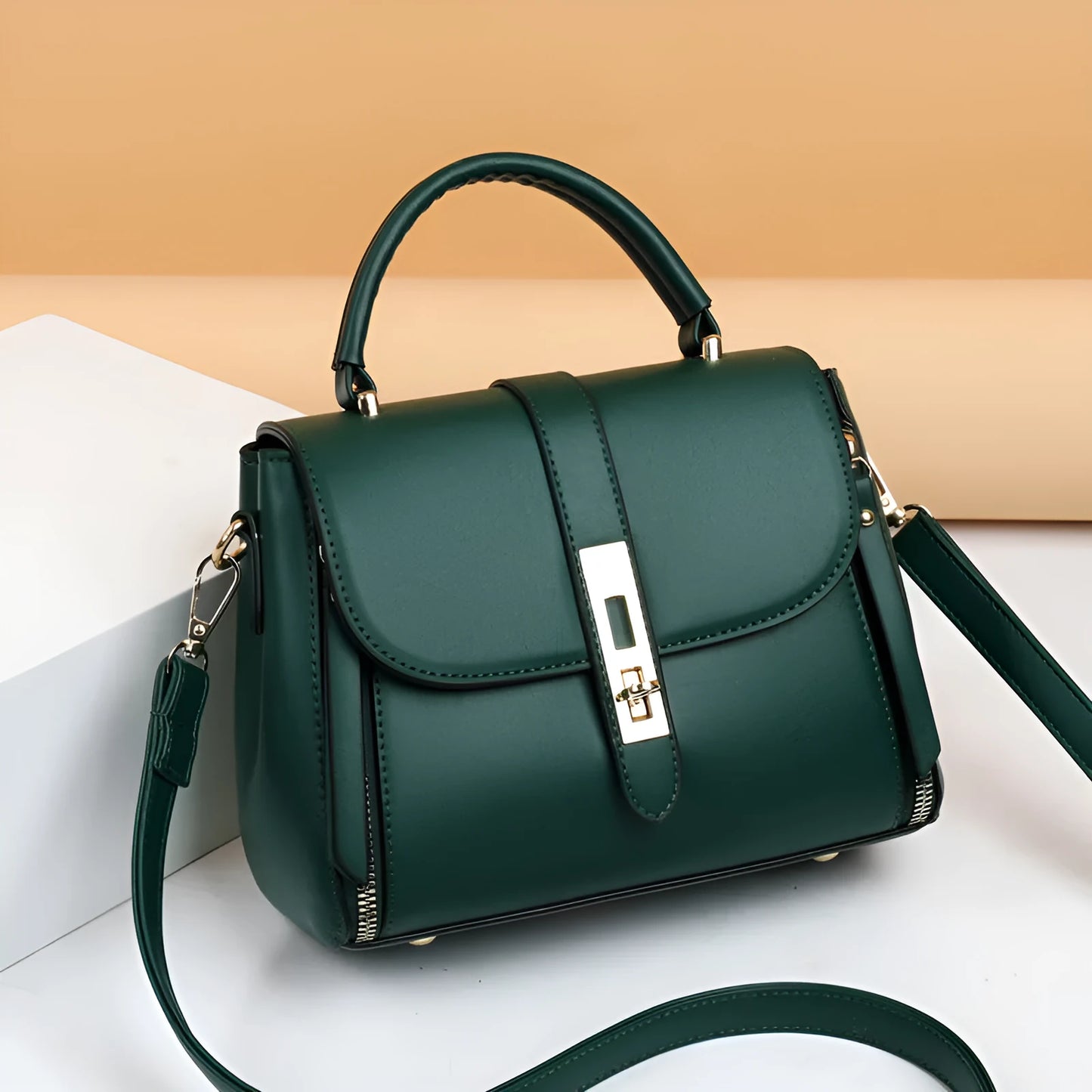 Women's soft black PU leather messenger bag with adjustable strap shown front-on.