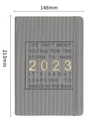 Creative student almanac calendar with imitation leather cover open to show weekly layout