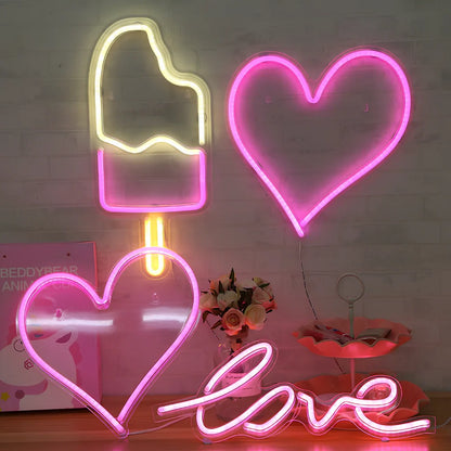 USB-powered neon wall lamp showing Banana shape with pink lighting against dark wall