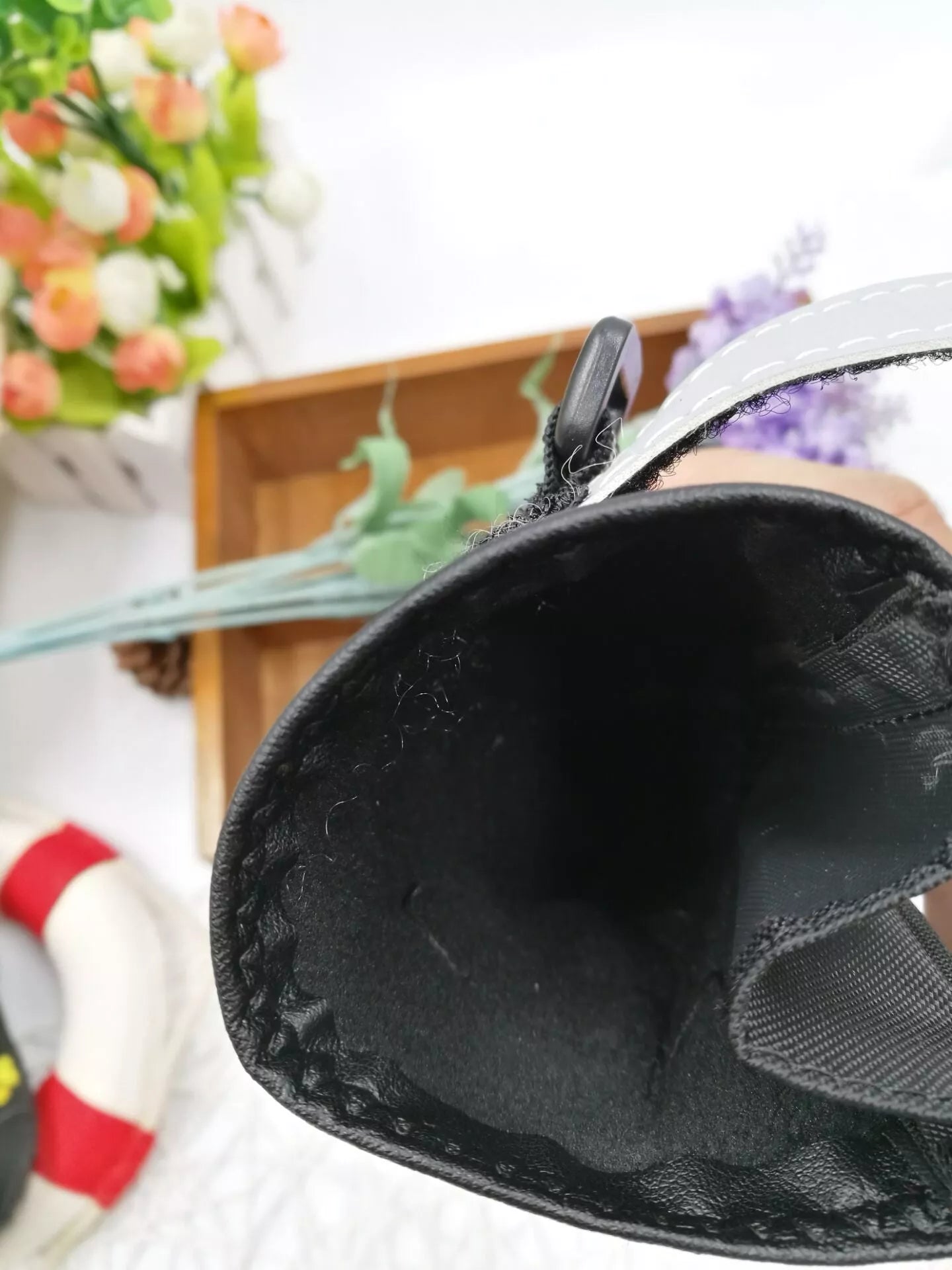 Black waterproof dog shoes with non-slip soles and adjustable fuzzy belt