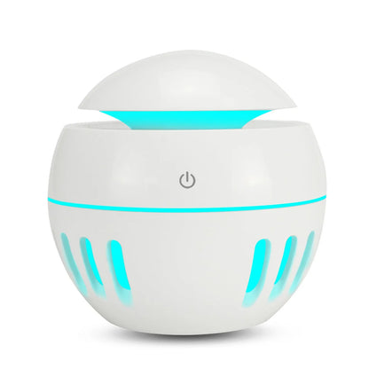 Portable USB humidifier in dark wood, light wood or white with 1 litre water tank and single fog outlet.