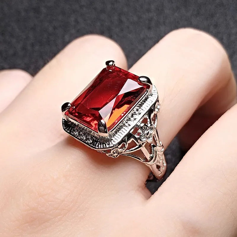 Women's adjustable geometric ring with pigeons-blood ruby stones in platinum colour finish