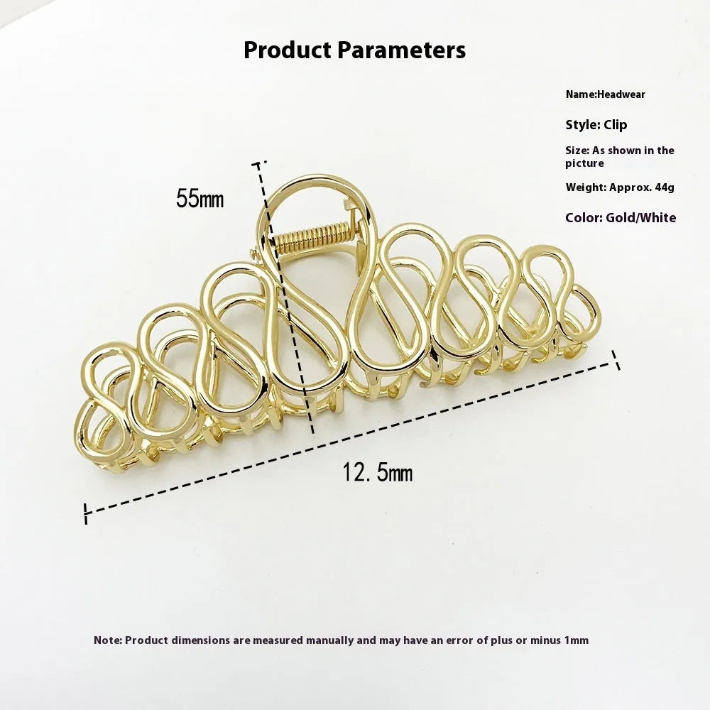 Large minimalist alloy hair clip with electroplated gold finish and irregular tassel decoration for creating updo hairstyles