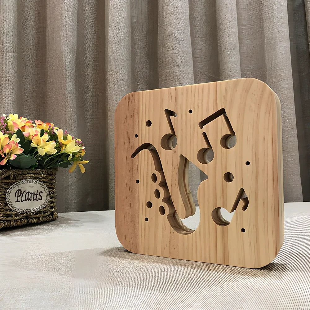 3D wood carving LED night light depicting musical instruments with USB power cable