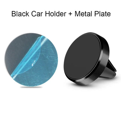 Silver aluminium alloy magnetic car phone holder with rotating ball head mounted on a car air vent.