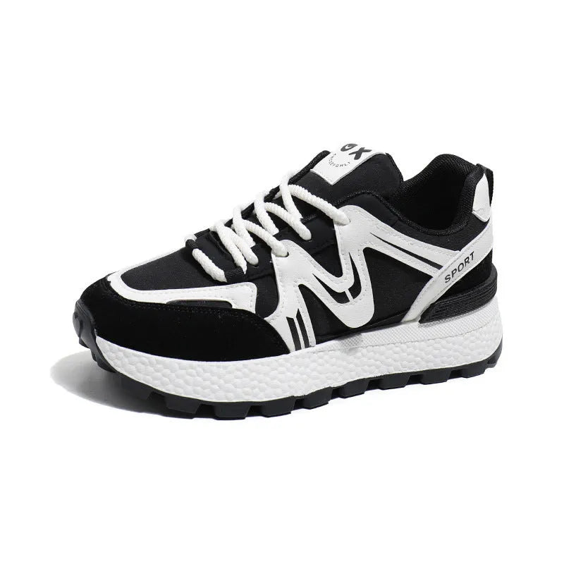 Women's black sports casual shoes with round toe and front lace-up design on a flat heel.