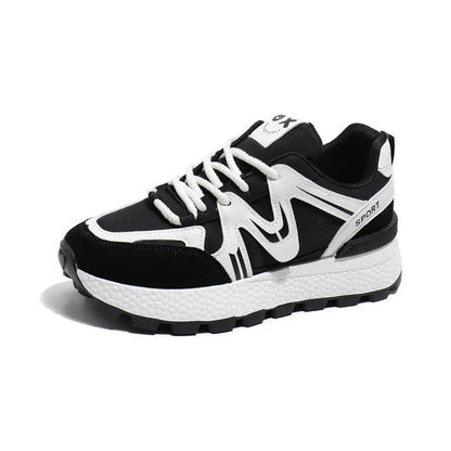 Women's black sports casual shoes with round toe and front lace-up design on a flat heel.