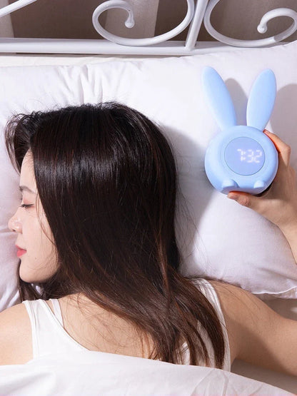 Adorable bunny-eared digital alarm clock with LED display, sound control, and magnetic design