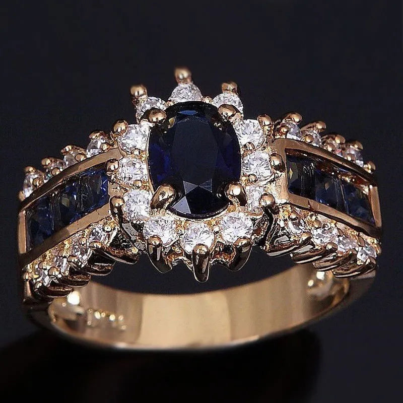 Personalised diamond-treated zinc alloy rings in blue and purple designs with size options 6-11