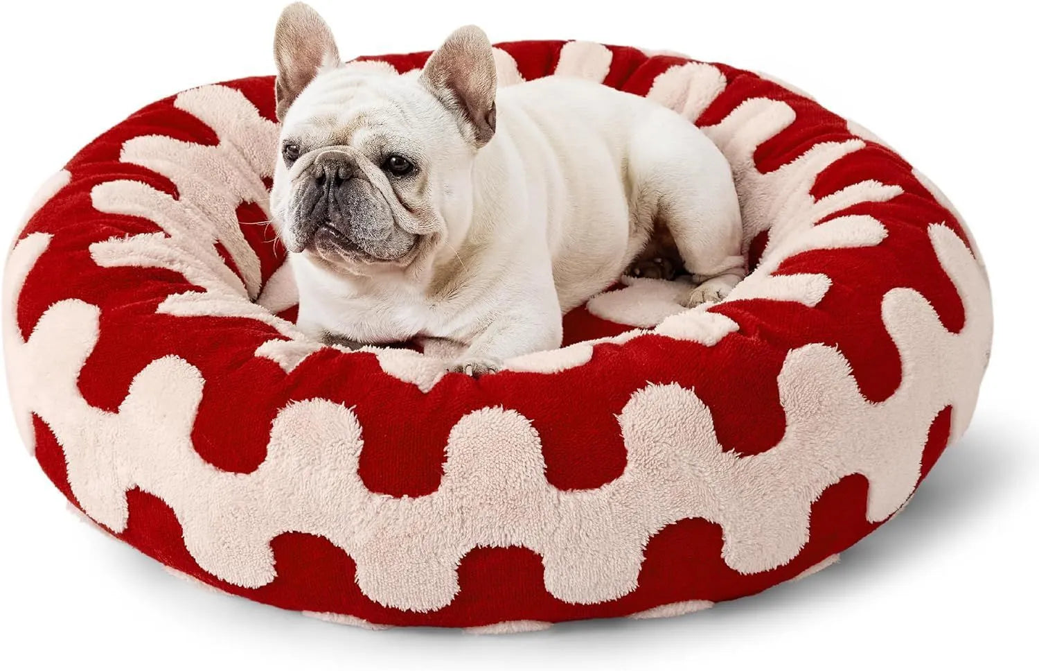 Round blue and white plaid dog bed with plastic sides on wooden floor