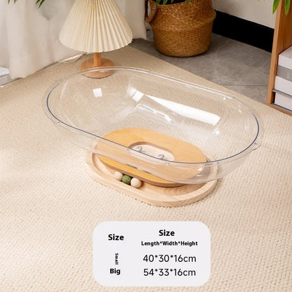 Transparent acrylic space capsule cat bed on a turntable base for cats.