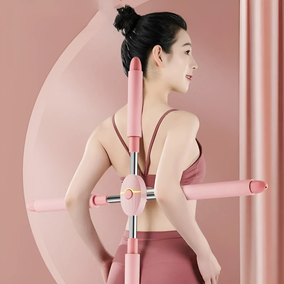 Blue and pink children's adjustable open back yoga stick for fitness body shaping, showing length adjustment.