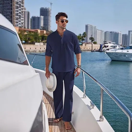 Men's casual cotton suit in a solid colour, featuring a long sleeve top and full-length trousers.
