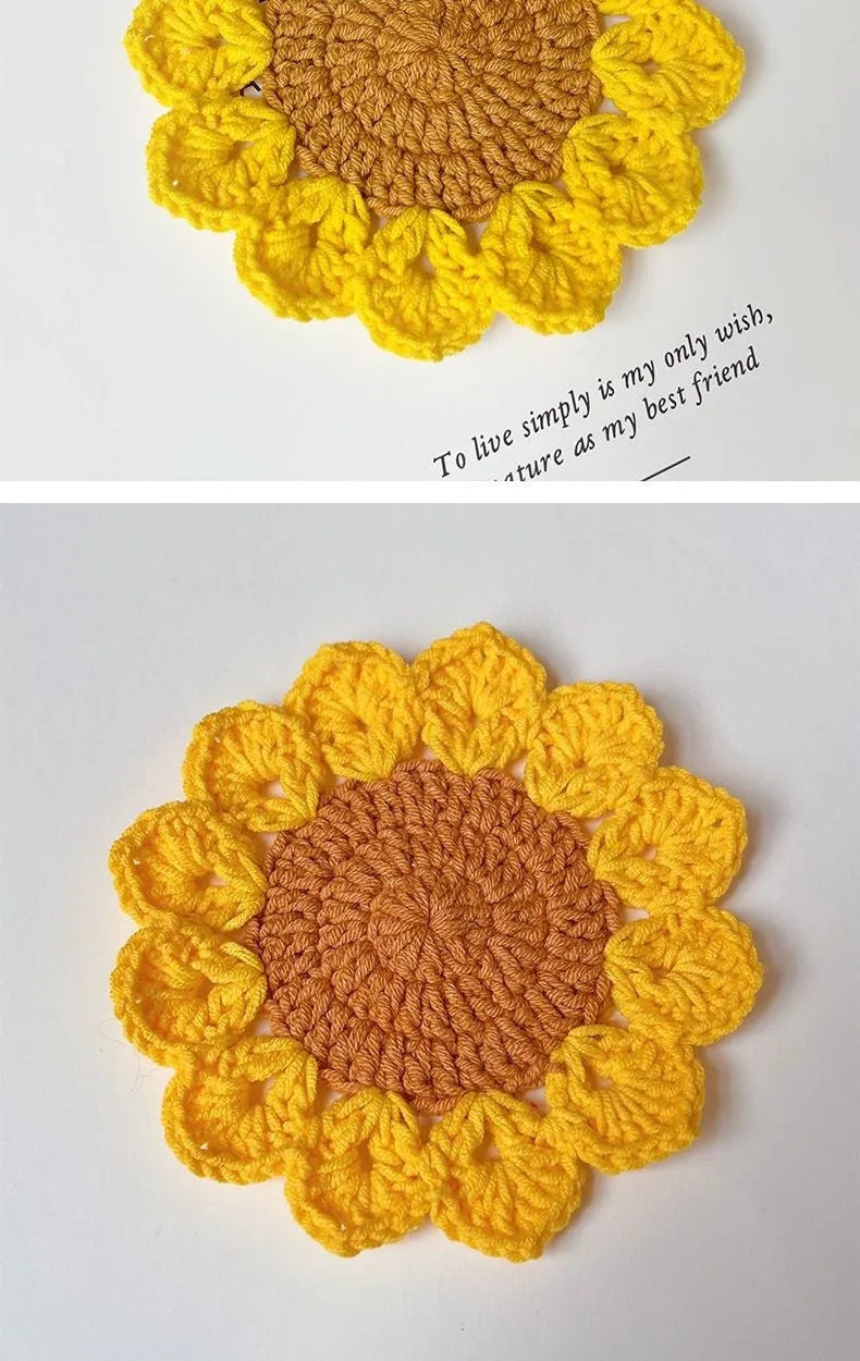 Hand-woven circular wool coaster with a flower pattern, part of a set for table protection.