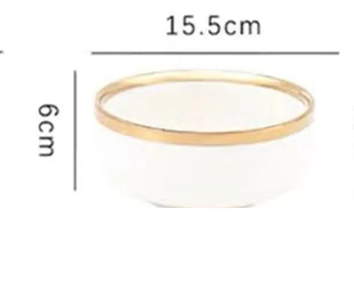Platinum-coloured porcelain bowl and plate with gold rim, part of a wedding gift tableware set.