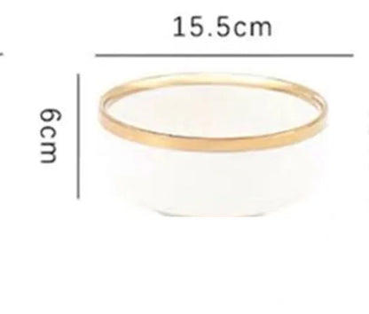 Platinum-coloured porcelain bowl and plate with gold rim, part of a wedding gift tableware set.