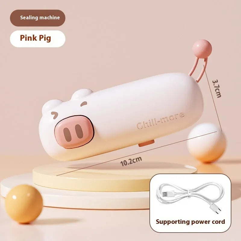 Pink handheld bag sealer machine with USB charging port and cartoon design