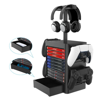 Black ABS gaming storage rack holding vertical game cases, a headset on top, controllers on side hooks, and a pull-out drawer open.