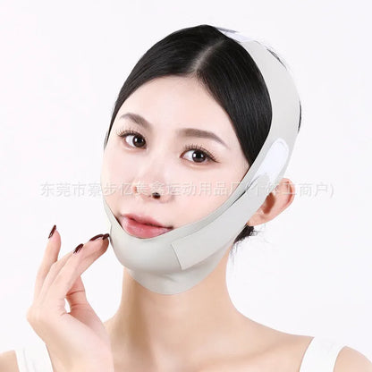 Green and purple breathable fabric V face shaping mask for lifting and tightening.