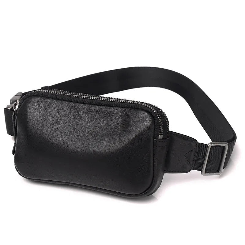 Men's small leather crossbody bag in black showing compact dimensions and crossbody strap