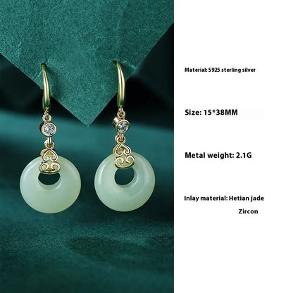 Chinese style sterling silver and Hetian jade jewellery set with bracelet, necklace, and earrings.