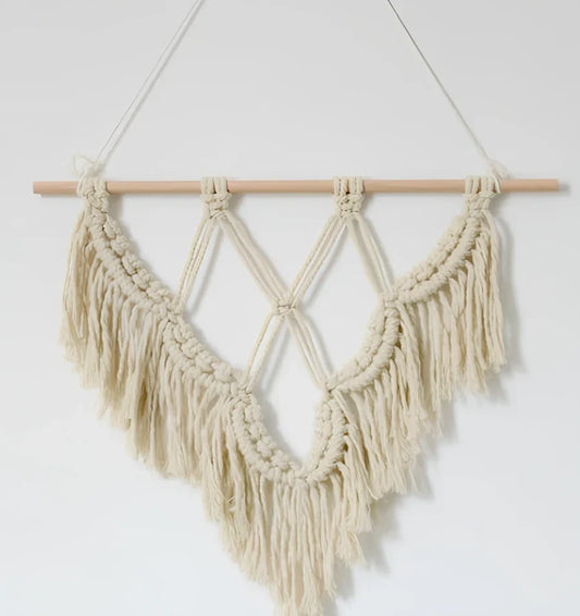 Handmade boho macrame wall hanging in pink cotton rope, 40cm high 50cm wide with wooden rod and natural seeds