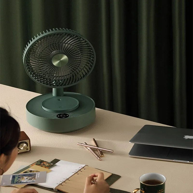 Green rechargeable floor fan with humidifier in extended position showing telescopic design