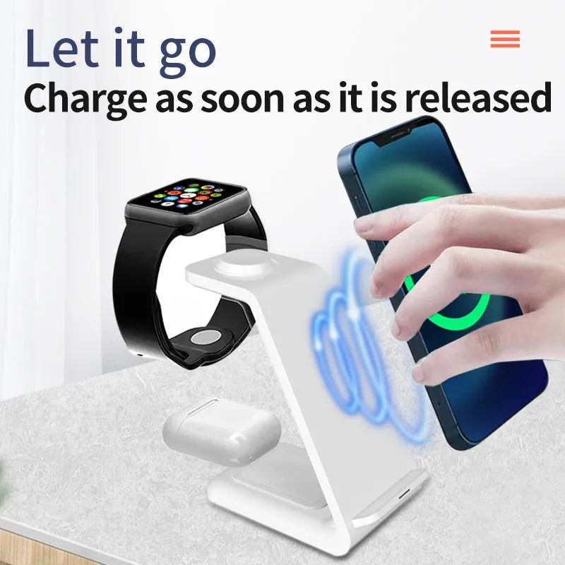 White 3-in-1 wireless charging station with phone upright in holder, watch and earbuds on charging pads