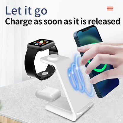 White 3-in-1 wireless charging station with phone upright in holder, watch and earbuds on charging pads