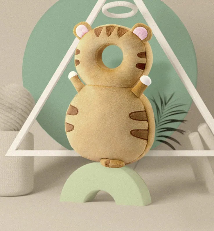 Round baby neck pillow in animal design with elastic straps for anti-fall protection.
