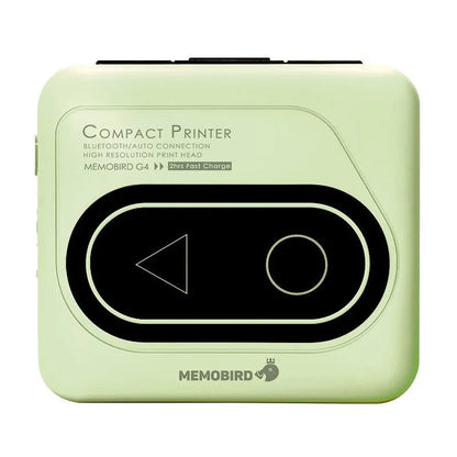 Avocado green Bluetooth mini thermal printer on a table next to a mobile phone.