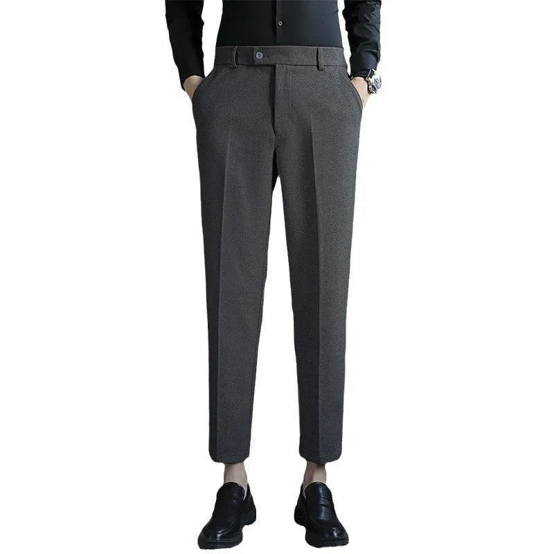 Straight-leg brown corduroy trousers with elastic waistband on size chart