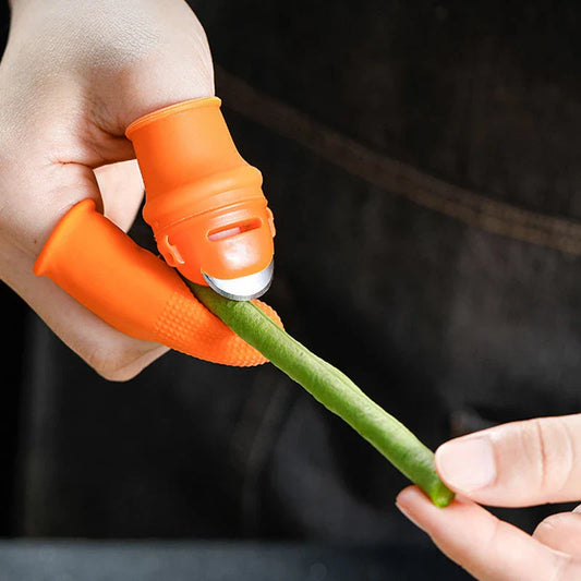 Silicone thumb protector with sharp curved blade for effortless vegetable, fruit, and crop harvesting in the garden or farm