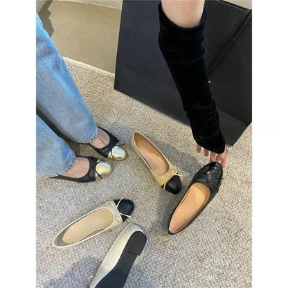 Apricot flat ballet shoes with a bowknot, round toe, and soft rubber sole.