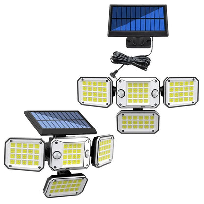 Multi-angle solar-powered garden lamp with motion sensor mounted outdoors