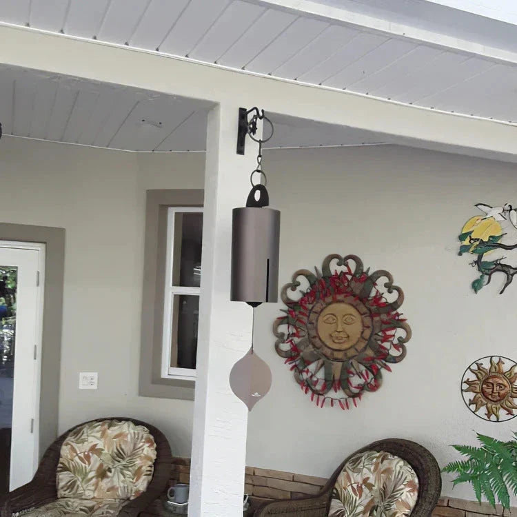 Elegant iron wind chimes in black and brown colors, designed for decorative garden and outdoor use