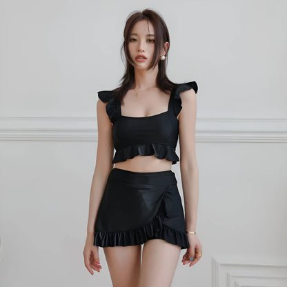 Black women's split bikini swimsuit in briefs style on a mannequin