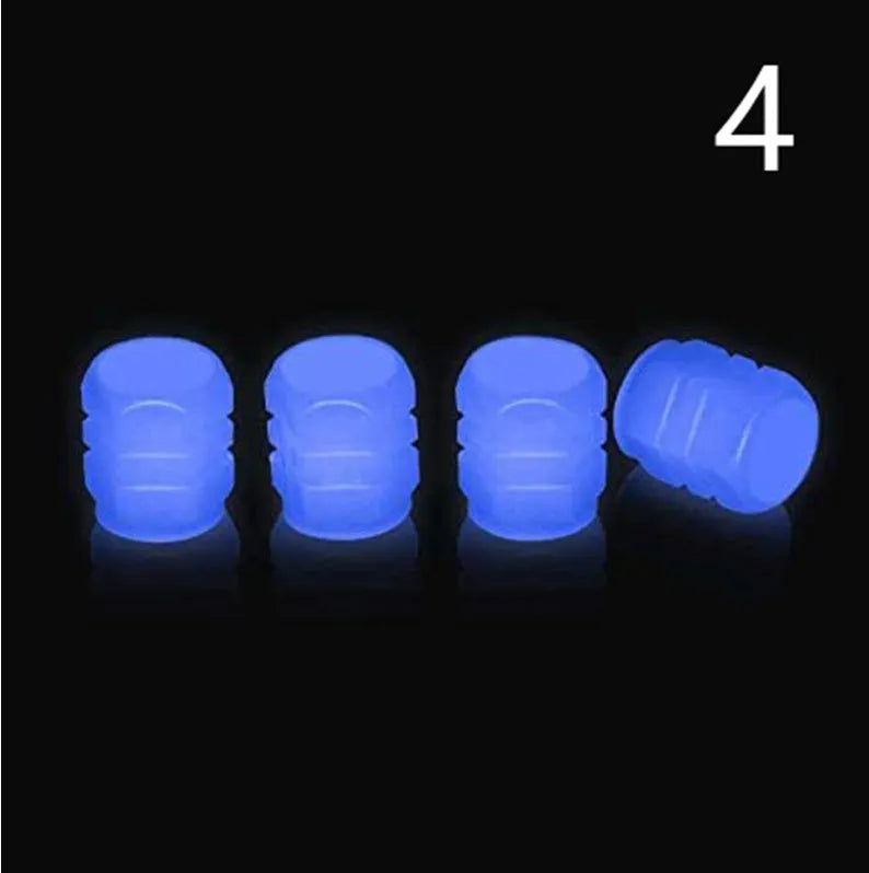 Glow-in-the-dark rubber tyre valve caps in five colour options on tyre valve stem