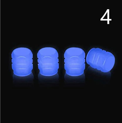 Glow-in-the-dark rubber tyre valve caps in five colour options on tyre valve stem