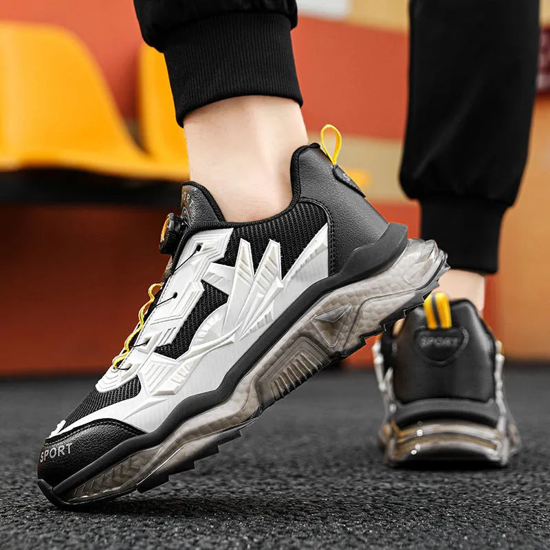 Men's black casual shoes with a rotating button fastener and mesh upper on a low platform sole
