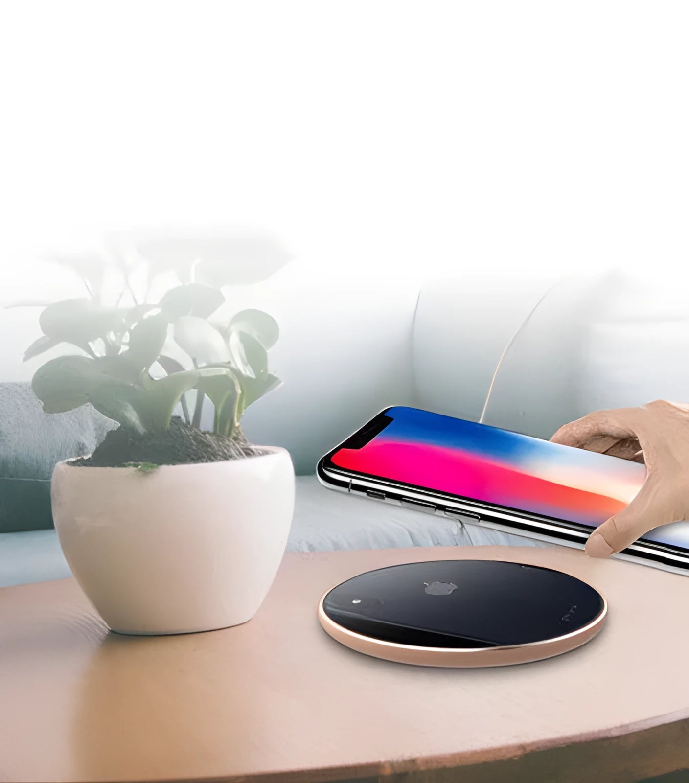 Ultra-thin aluminium wireless charger in rose gold with micro USB port and status light.