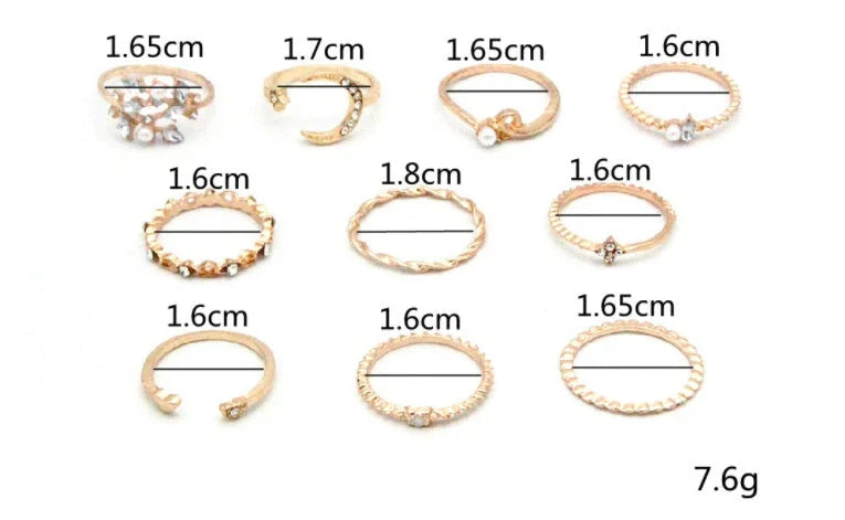 Gold-plated adjustable ring set with moon, star, and leaf charms in a bohemian style