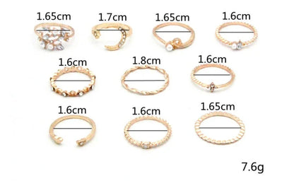 Gold-plated adjustable ring set with moon, star, and leaf charms in a bohemian style