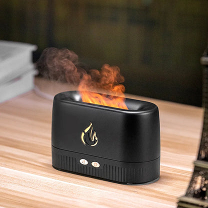 Black simulated flame aromatherapy humidifier with USB cable, water tank, and control buttons on a wooden surface.