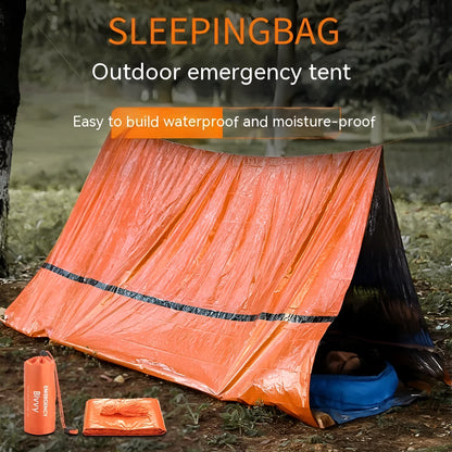 Orange emergency tent with sleeping bag and blanket disaster relief kit on ground