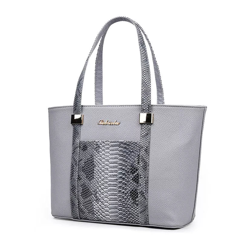 Women's shoulder bag with zipper closure and multiple pockets in light grey, black, off-white, and rose red