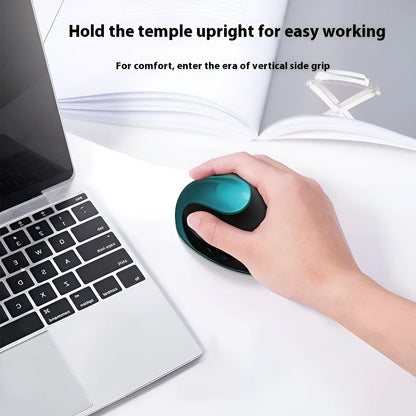 Ergonomic vertical mouse in black, shown next to a laptop, highlighting its unique upright shape and USB receiver.