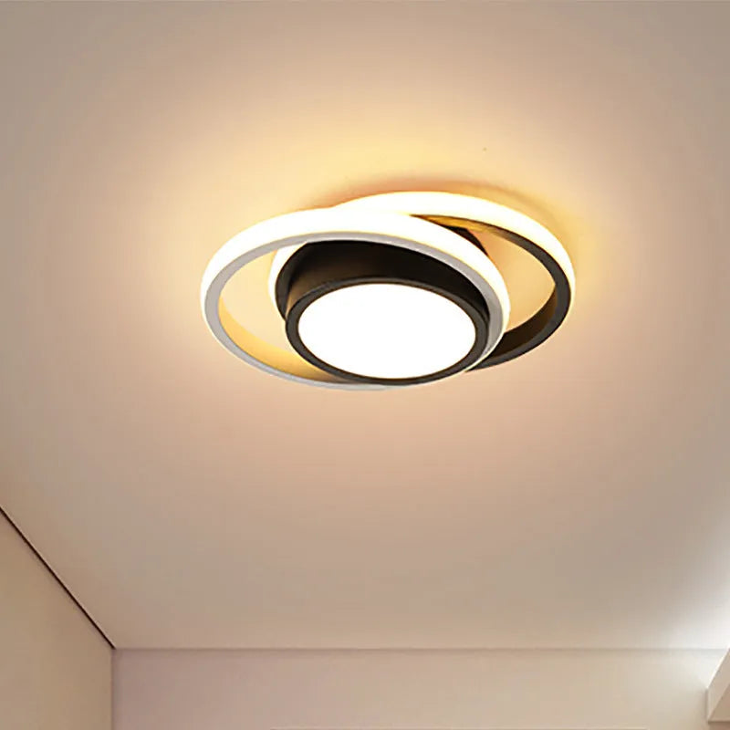 Modern geometric aluminium ceiling light in round and square styles with LED illumination.