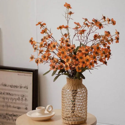 Bundle of four artificial dried flowers in orange, white, pink, and champagne colours for rustic decor